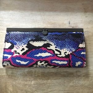 Purple and pink snake skin clutch wallet